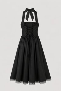 Black dress with halter neck and corset-style lacing on a light gray background