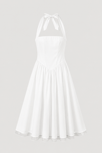 white front halter maxi dress with fitted bodice and full skirt